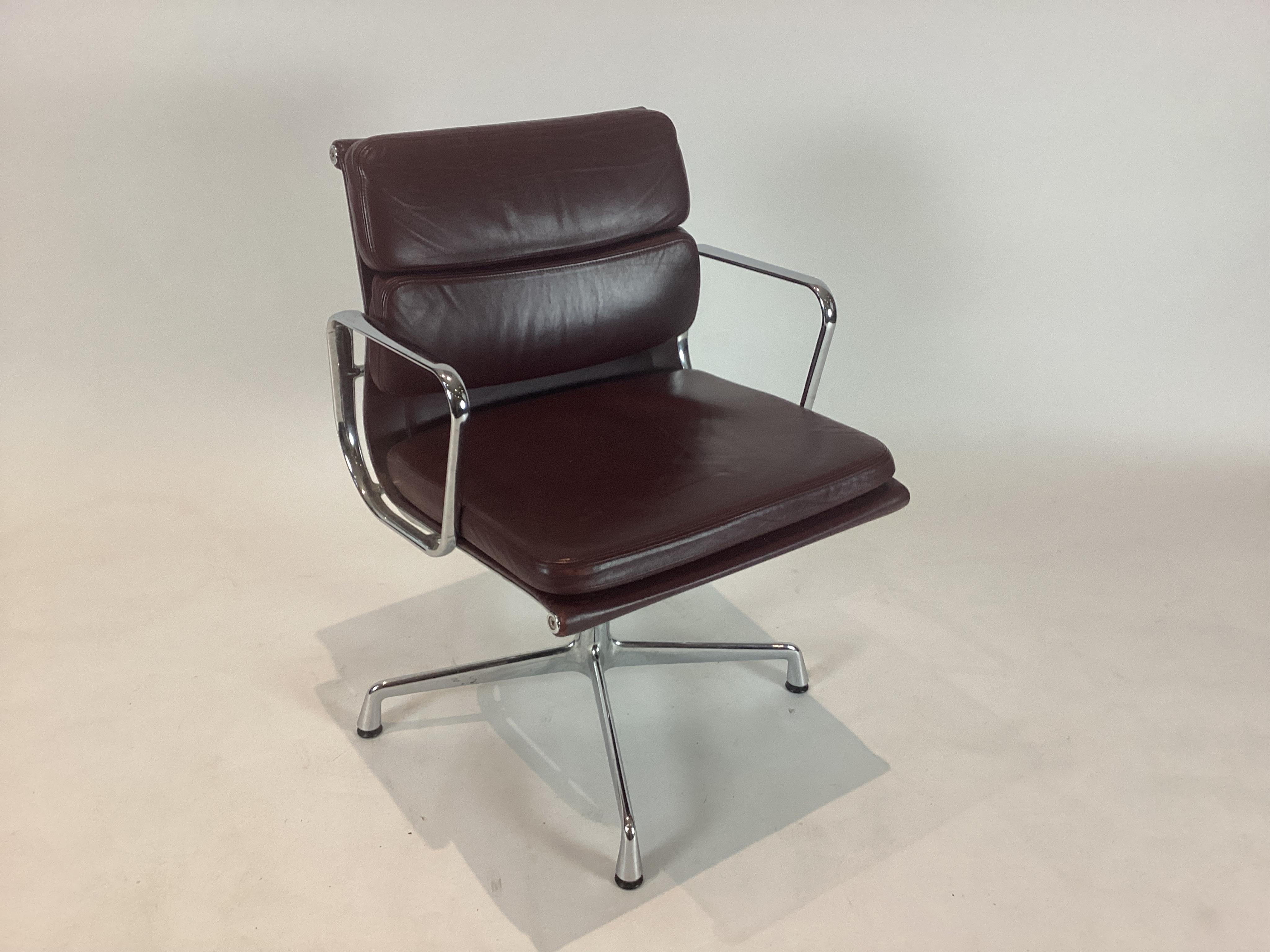 An Eames soft pad swivel desk chair, width 57cm, depth 52cm, height 81cm. Condition - fair